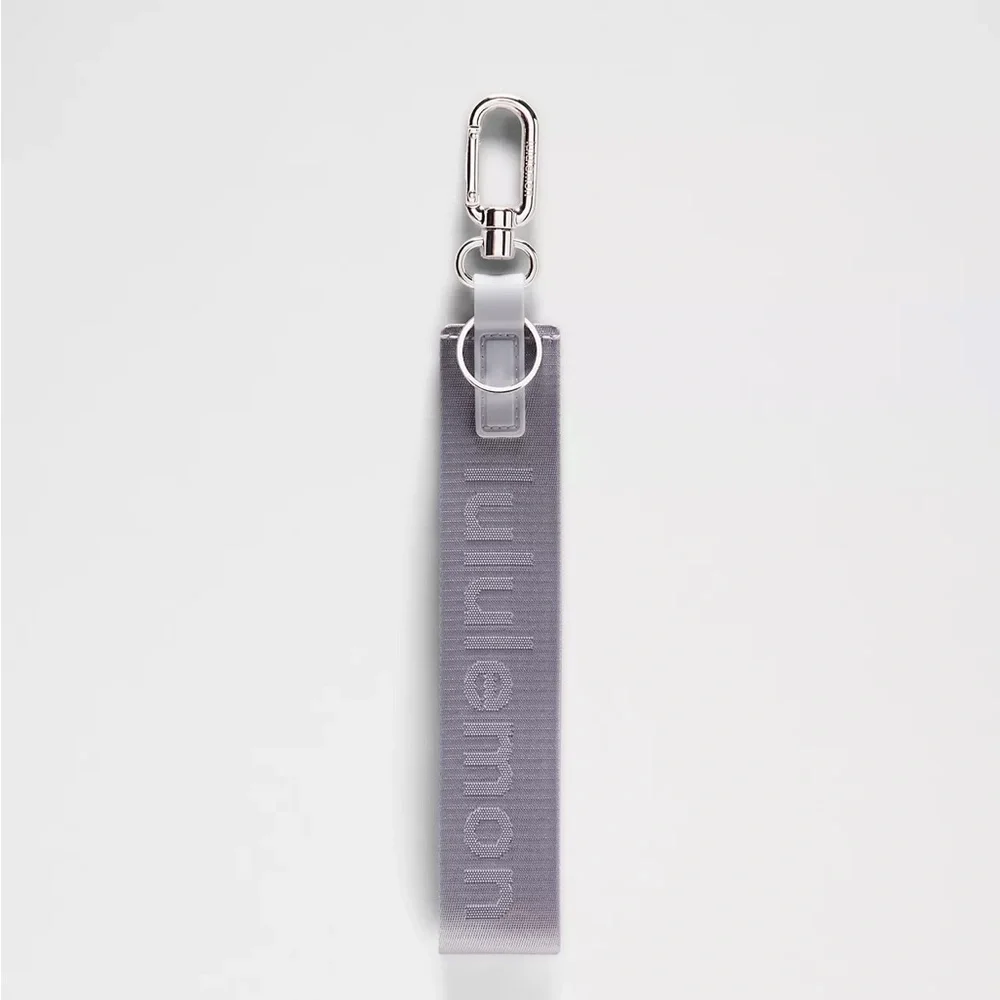 Lululemon Never Lost Keychain- Faint Lavender/Grape Mist